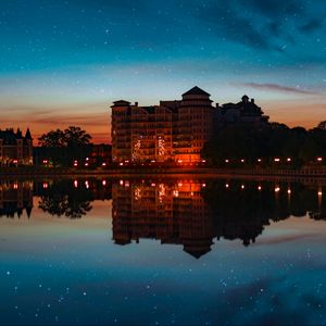 Preview wallpaper building, starry sky, architecture, sunset, reflection