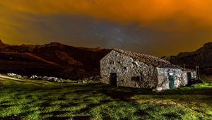 Preview wallpaper building, structure, grass, sky, night