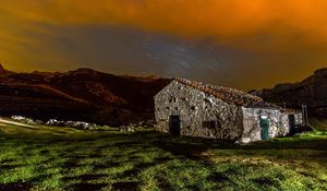 Preview wallpaper building, structure, grass, sky, night