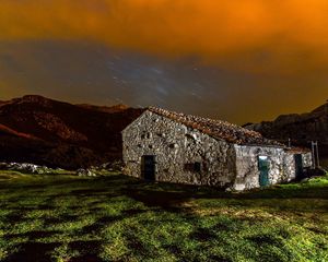 Preview wallpaper building, structure, grass, sky, night