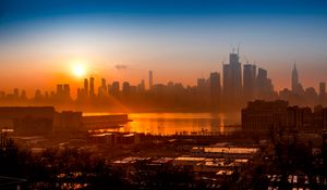 Preview wallpaper building, sun, sunrise, city, river