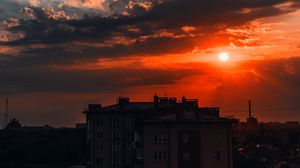 Preview wallpaper building, sunset, sky, clouds, architecture