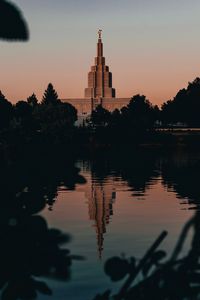 Preview wallpaper building, tower, architecture, lake, shore