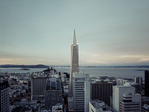 Preview wallpaper building, tower, city, roofs