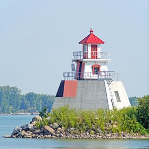 Preview wallpaper building, tower, range light, river