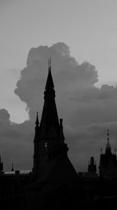 Preview wallpaper building, towers, silhouettes, clouds, evening