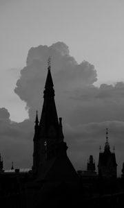 Preview wallpaper building, towers, silhouettes, clouds, evening