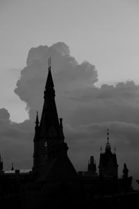 Preview wallpaper building, towers, silhouettes, clouds, evening