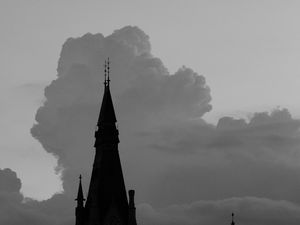 Preview wallpaper building, towers, silhouettes, clouds, evening