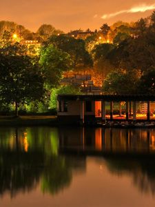 Preview wallpaper building, trees, landscape, night, lights, river