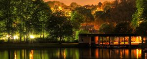 Preview wallpaper building, trees, landscape, night, lights, river