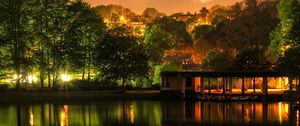 Preview wallpaper building, trees, landscape, night, lights, river