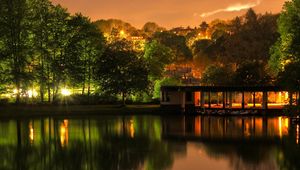 Preview wallpaper building, trees, landscape, night, lights, river