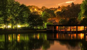 Preview wallpaper building, trees, landscape, night, lights, river