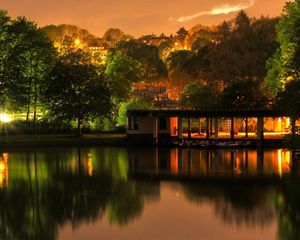 Preview wallpaper building, trees, landscape, night, lights, river