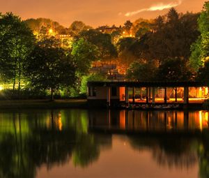 Preview wallpaper building, trees, landscape, night, lights, river