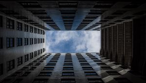 Preview wallpaper building, windows, architecture, sky, clouds, bottom view