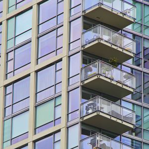 Preview wallpaper building, windows, balconies, flowers, plants