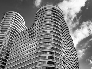 Preview wallpaper building, windows, facade, architecture, black and white, sky