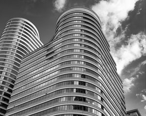 Preview wallpaper building, windows, facade, architecture, black and white, sky