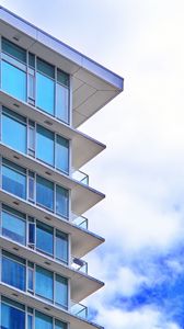 Preview wallpaper building, windows, glass, balconies, clouds, sky, blue