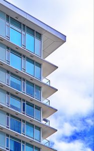 Preview wallpaper building, windows, glass, balconies, clouds, sky, blue