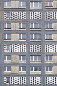 Preview wallpaper building, windows, pattern, texture, graffiti