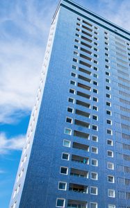 Preview wallpaper building, windows, sky, bottom view, blue