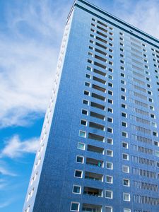 Preview wallpaper building, windows, sky, bottom view, blue