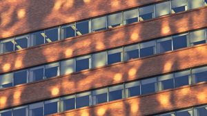 Preview wallpaper building, windows, sunlight, shadows