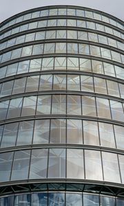 Preview wallpaper building, windows, walls, clouds, city, architecture