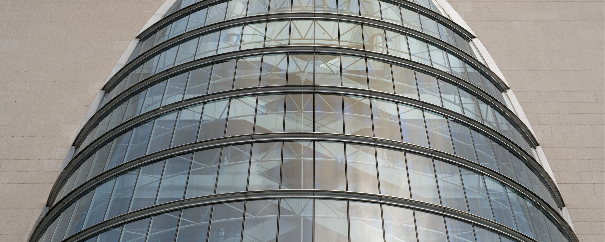 2560x1024 Wallpaper building, windows, walls, clouds, city, architecture