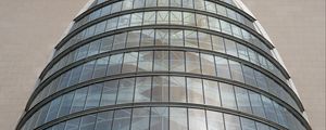 Preview wallpaper building, windows, walls, clouds, city, architecture