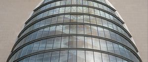 Preview wallpaper building, windows, walls, clouds, city, architecture