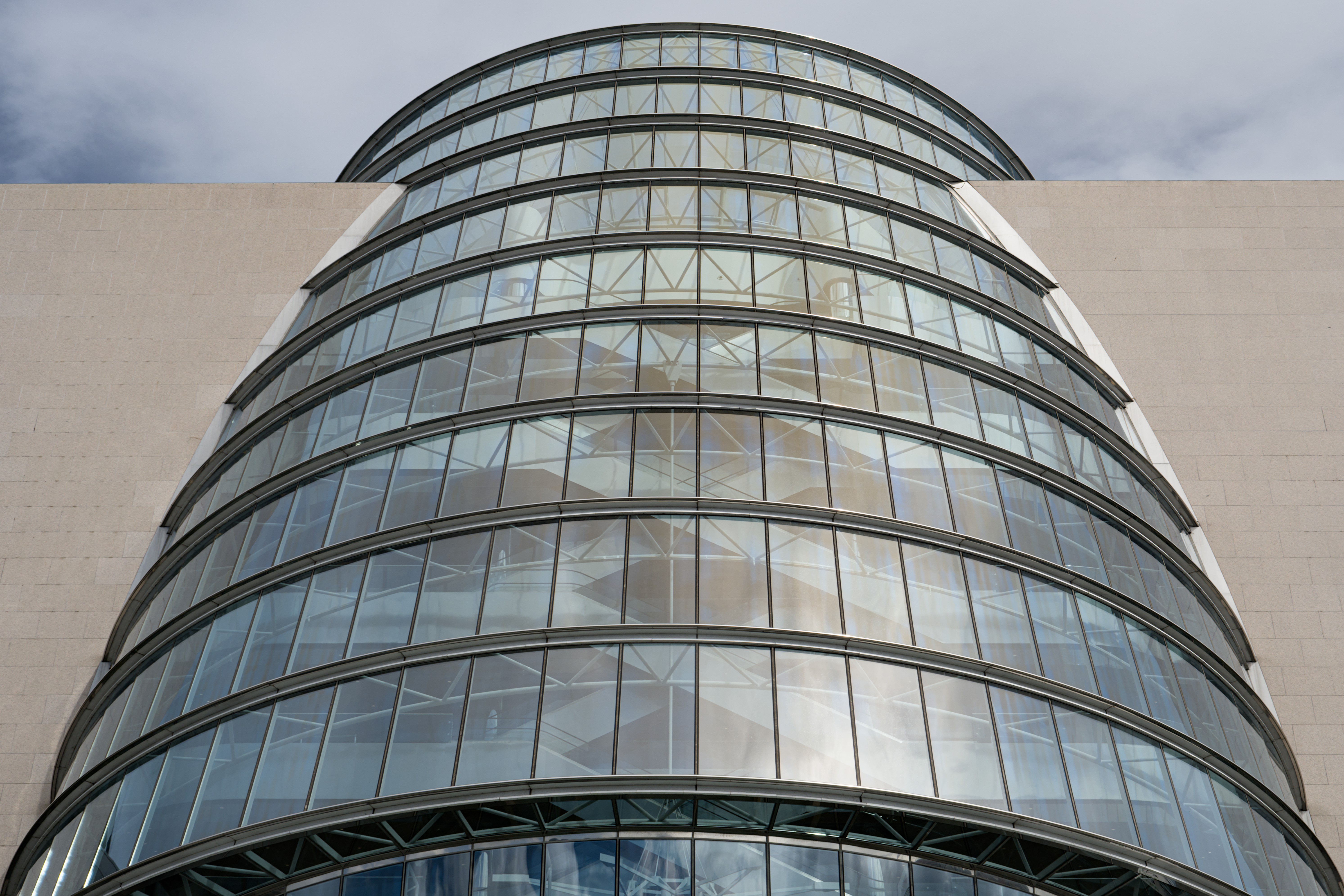 5973x3982 Wallpaper building, windows, walls, clouds, city, architecture