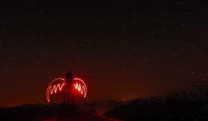 Preview wallpaper building, wings, light, long exposure, night, dark