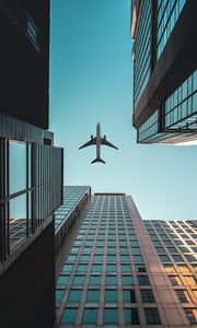 Preview wallpaper buildings, airplane, skyscrapers, sky