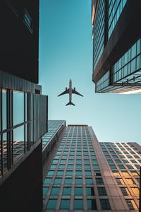 Preview wallpaper buildings, airplane, skyscrapers, sky