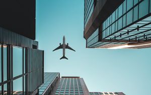 Preview wallpaper buildings, airplane, skyscrapers, sky