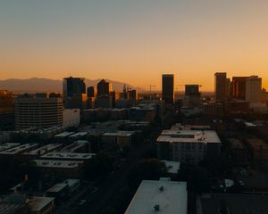 Preview wallpaper buildings, architecture, city, road, sunset, evening