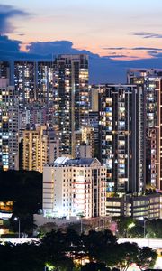 Preview wallpaper buildings, architecture, city, sunset, evening, lights