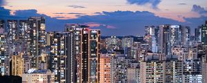 Preview wallpaper buildings, architecture, city, sunset, evening, lights