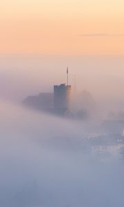 Preview wallpaper buildings, architecture, fog, clouds