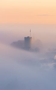 Preview wallpaper buildings, architecture, fog, clouds