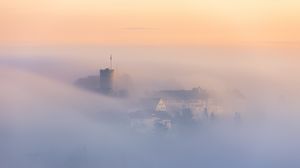 Preview wallpaper buildings, architecture, fog, clouds