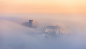 Preview wallpaper buildings, architecture, fog, clouds