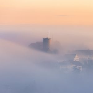 Preview wallpaper buildings, architecture, fog, clouds