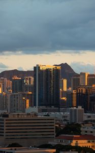 Preview wallpaper buildings, architecture, mountains, sunset, city