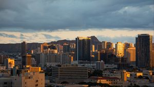 Preview wallpaper buildings, architecture, mountains, sunset, city