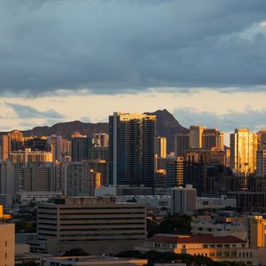 Preview wallpaper buildings, architecture, mountains, sunset, city